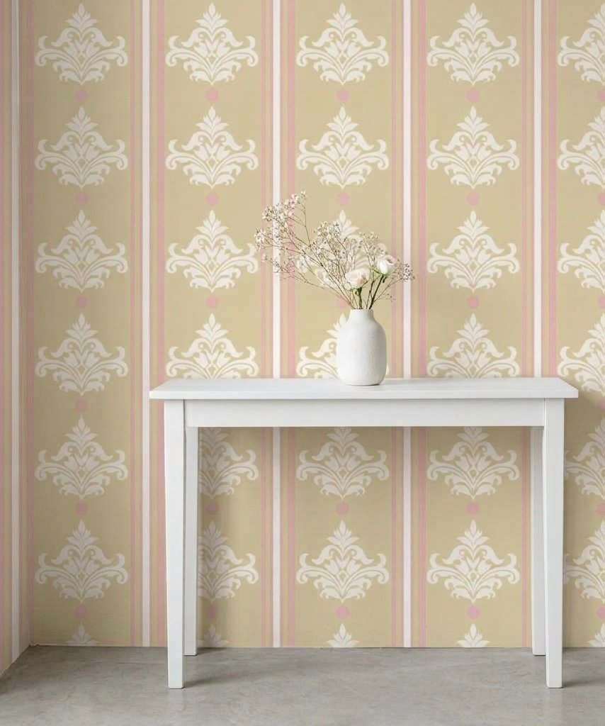 Pale ochre wallpaper with blush and ivory motifs