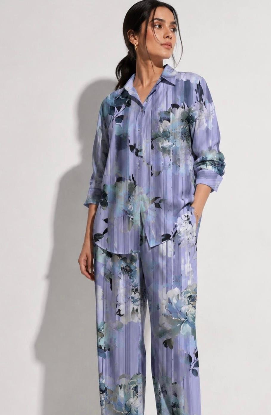 A coordinated shirt and trousers featuring the lilac botanical print