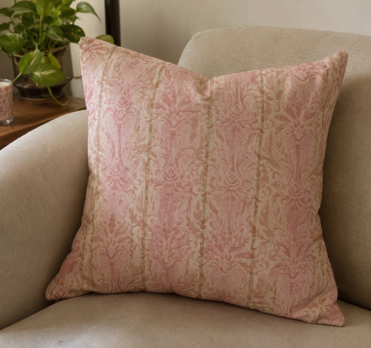 Soft pink damask cushion